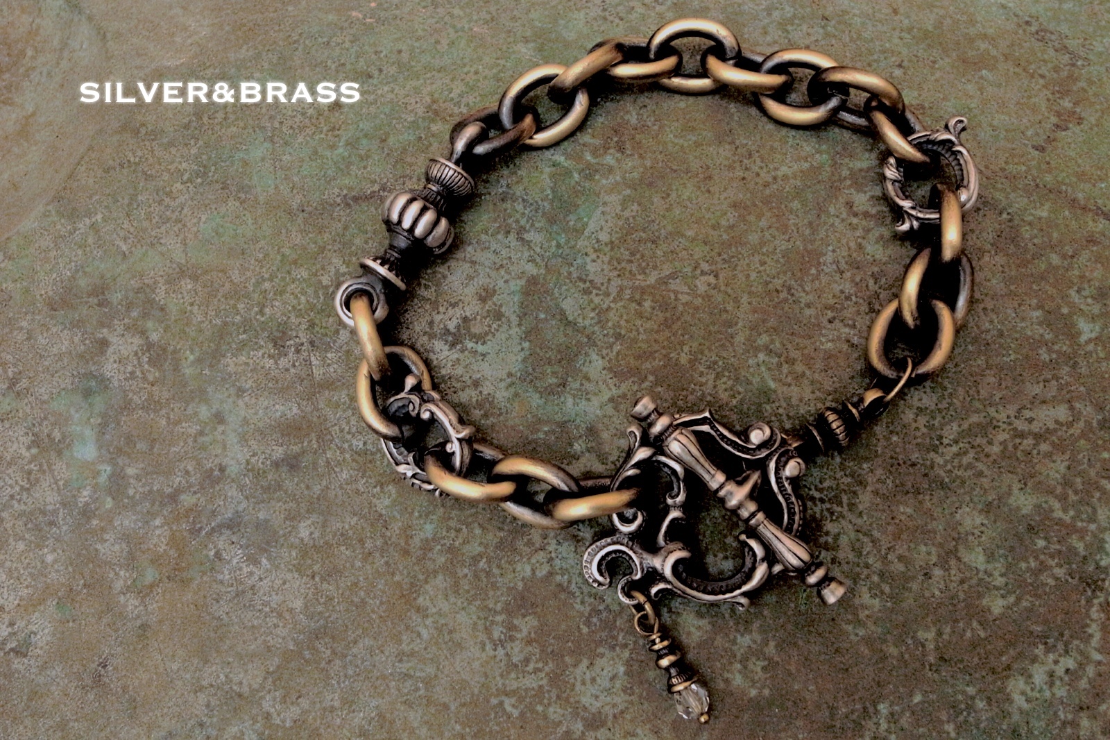 シルバーと真鍮のコンビ【Rococo Mantel Brass Chain Bracelet "Triple Point"】